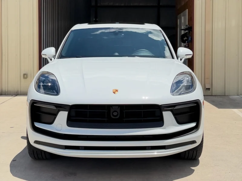 White Porsche Macan SUV with dark side glass in the window tinting College Station area