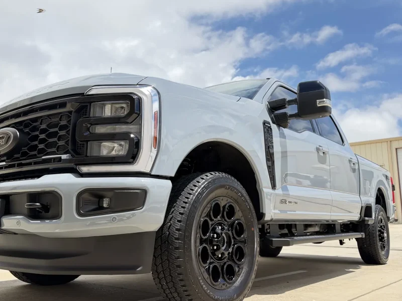 Front view of light gray Ford pickup truck completed with window tinting Navasota TX
